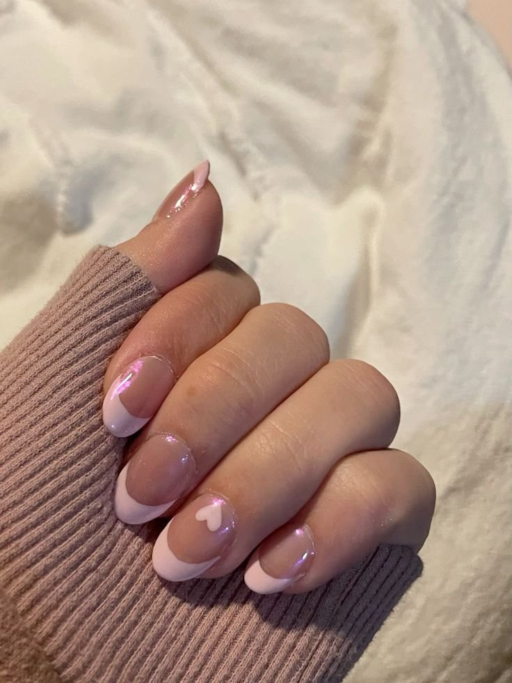 Light Pink French Tip Chrome Nails with a Heart Accent