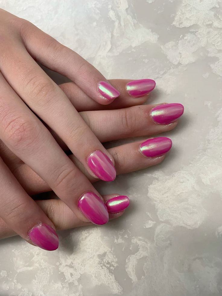 Pink Chrome Nails with a shiny metallic finish